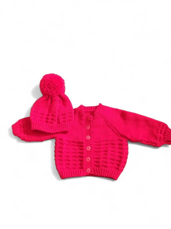 Red Cardigan & Matching pom pom hat.