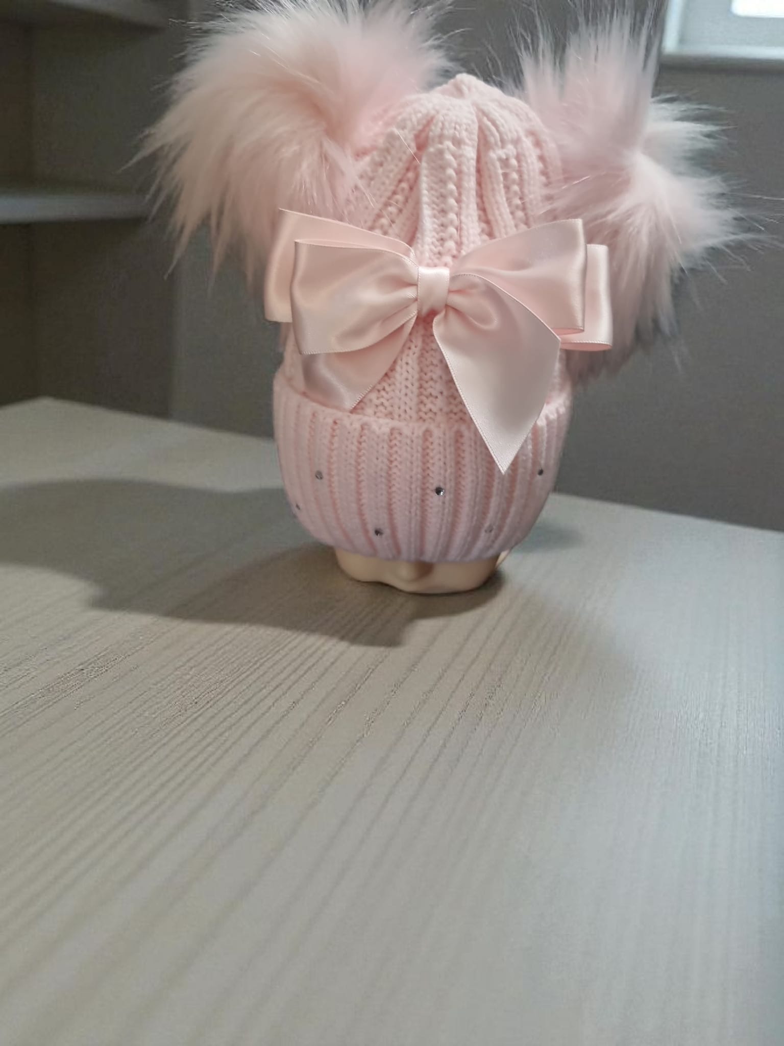 Pink double pom pom hat